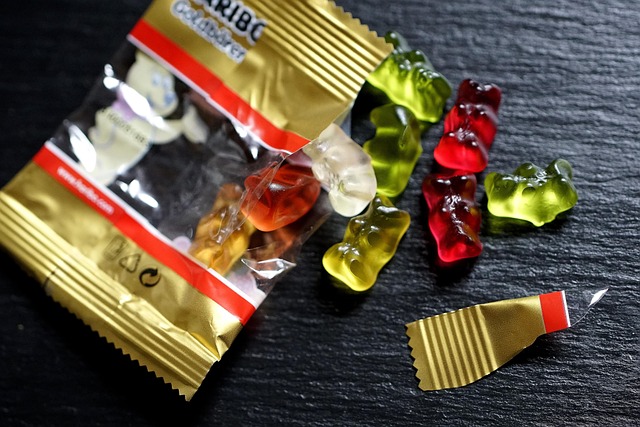 Close-up of Candizi gummy ingredients including Ashwagandha root and Vitamin C