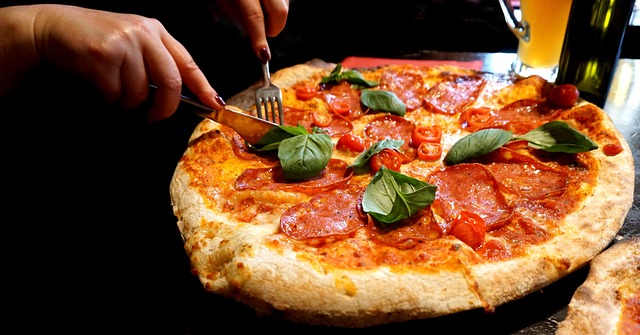 Close-up of a pizza crust with good charring and texture (best pizza near me)