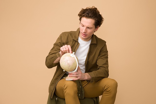 Person looking thoughtfully at a computer screen, considering a salary negotiation