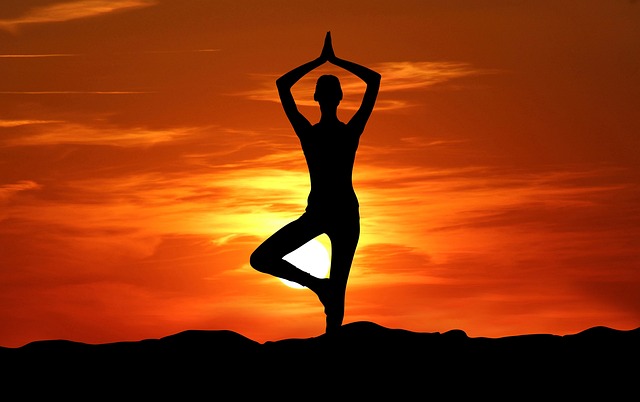 person meditating outdoors