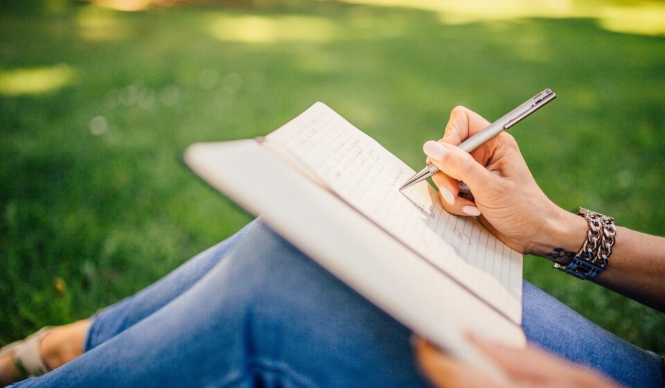 person writing cover letter