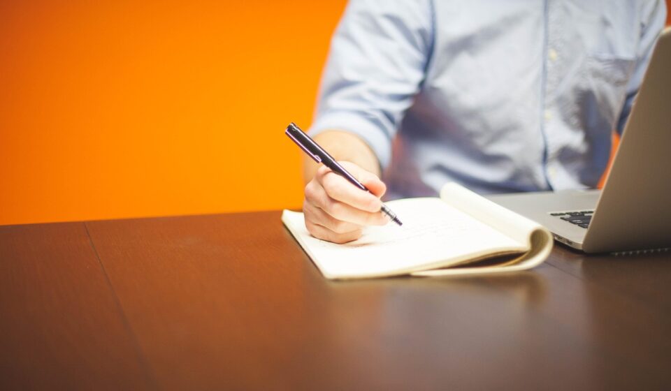 professional person writing letter