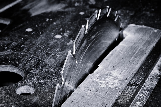Close-up of a keyhole saw blade showing aggressive teeth and a sharpened point