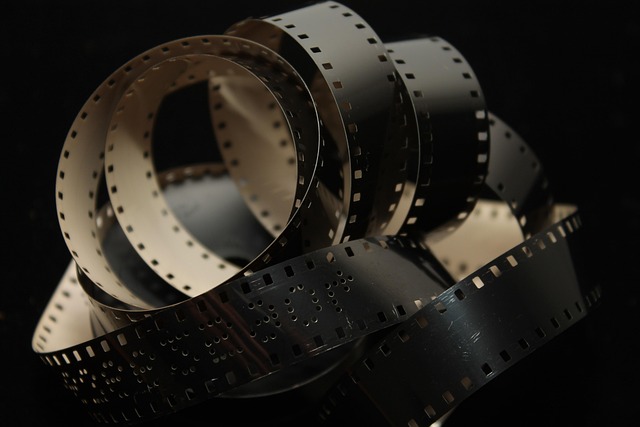 collection of classic film reels on a shelf