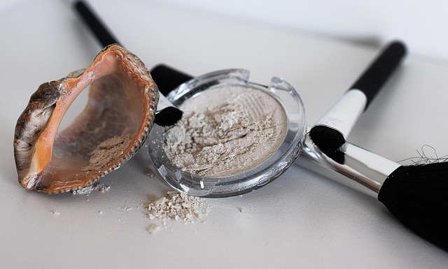 Collection of professional makeup brushes and products