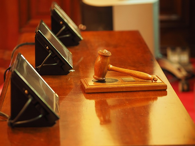 Courtroom illustration representing legal proceedings