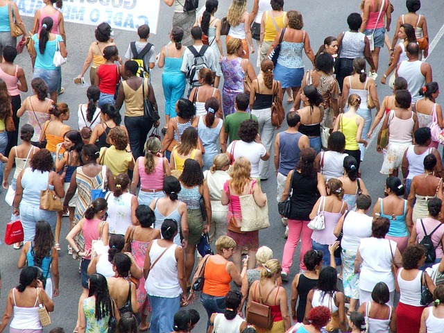 Photo of a diverse group of people receiving healthcare services at a modern clinic