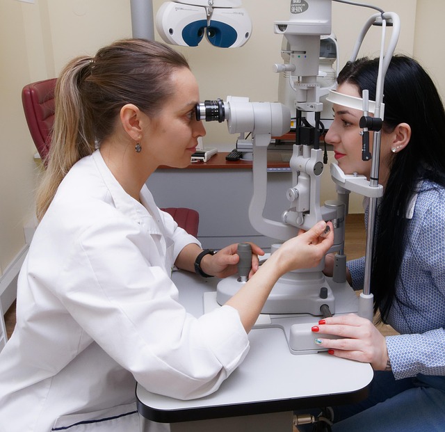 Doctor examining a patient's arm for a bite mark
