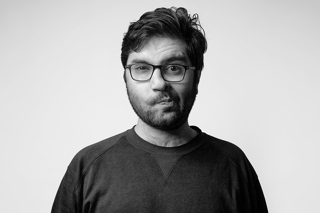 Illustration of a person looking confused at a screen full of emojis
