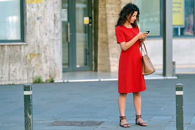 Person looking stressed while trying to communicate via a broken phone line