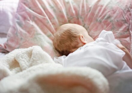 person sleeping cool under blanket
