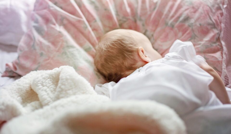 person sleeping cool under blanket