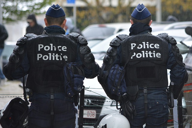 Police officers in tactical gear responding to an incident