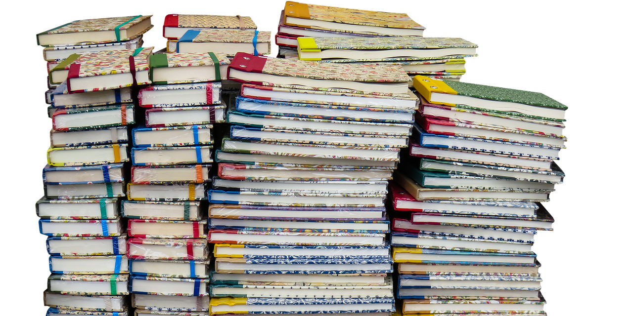 stack of diverse communication books