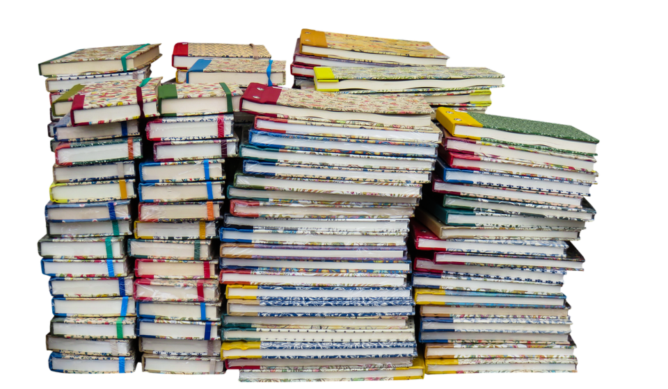 stack of diverse communication books
